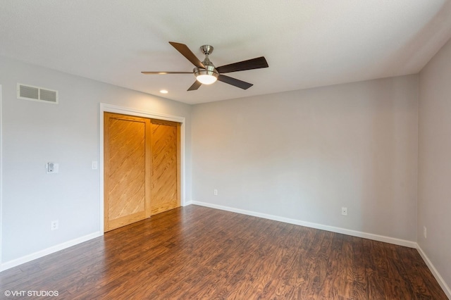 4337 Park Ct, Urbandale, IA 50322 - unfurnished bedroom with baseboards, dark wood finished floors, recessed lighting, ceiling fan, and a closet