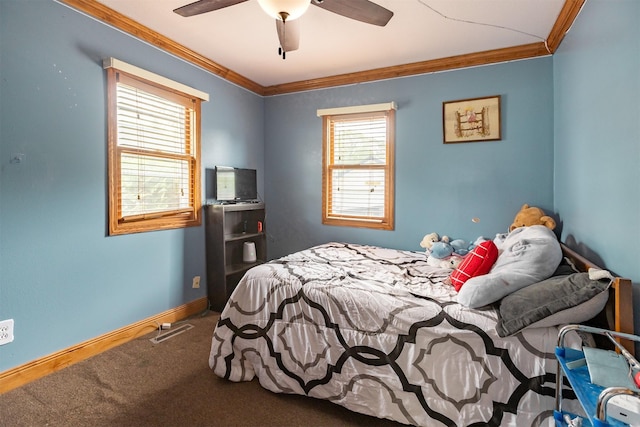 3919 69th St, Urbandale, IA 50322 - bedroom featuring crown molding, carpet flooring, baseboards, and ceiling fan