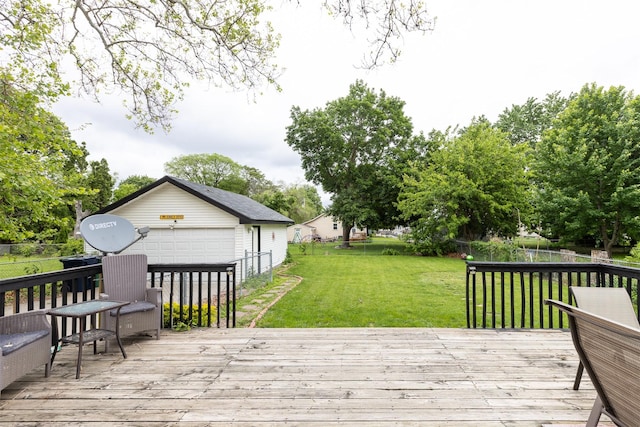 3919 69th St, Urbandale, IA 50322 - wooden deck featuring a garage and an outdoor structure