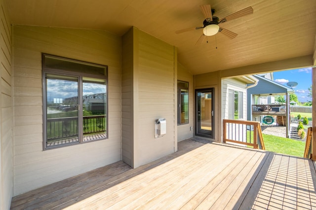 916 NE Silkwood St, Grimes, IA 50111 - wooden terrace with a ceiling fan