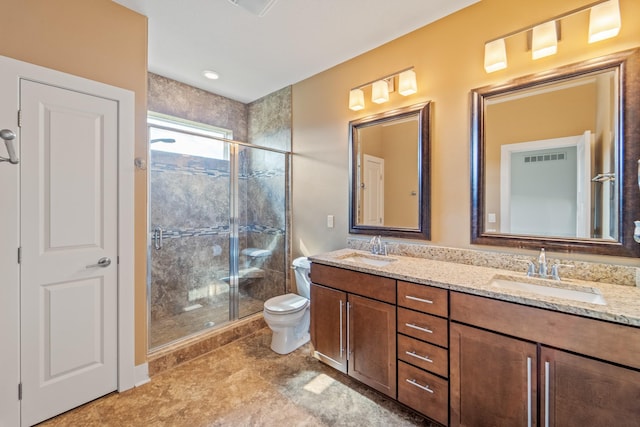 916 NE Silkwood St, Grimes, IA 50111 - full bathroom with double vanity, a stall shower, and toilet