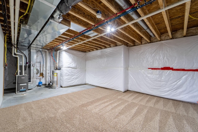 916 NE Silkwood St, Grimes, IA 50111 - unfinished below grade area featuring gas water heater and heating unit