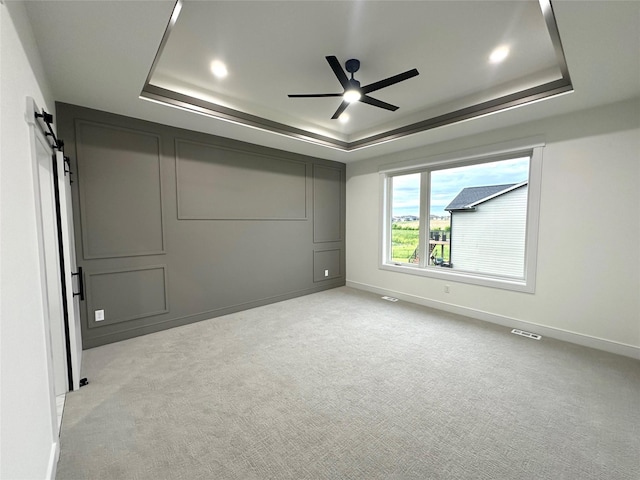 16332 Northpark Dr, Urbandale, IA 50323 - unfurnished bedroom featuring a raised ceiling, carpet floors, baseboards, and recessed lighting