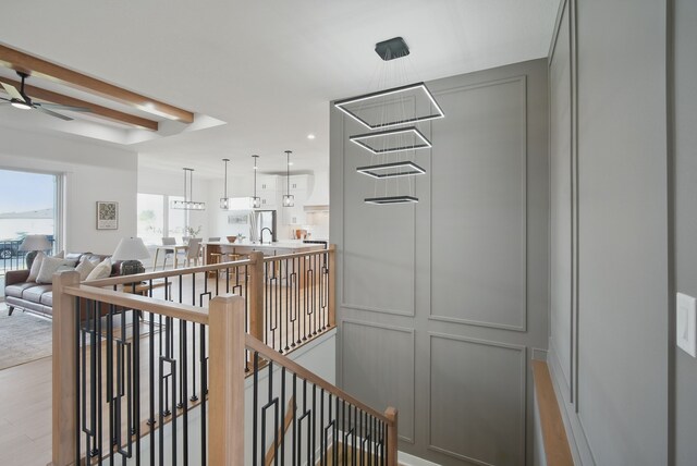 16332 Northpark Dr, Urbandale, IA 50323 - corridor featuring an upstairs landing
