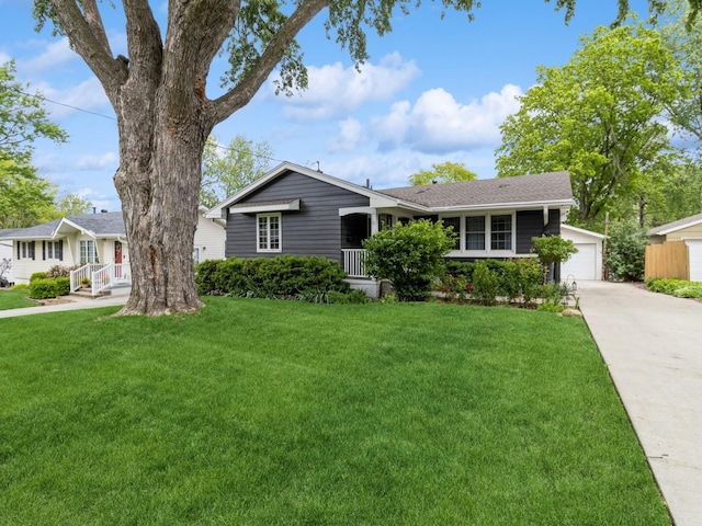 609 31st St, West Des Moines, IA 50265 - ranch-style house with a front yard, driveway, and roof with shingles