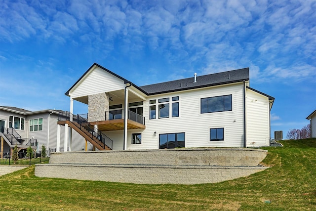 6204 Aspen Dr, West Des Moines, IA 50266 - rear view of house featuring a ceiling fan, stairway, and central AC