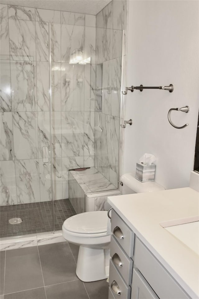 730 Kitterman Cir, Norwalk, IA 50211 - full bath with vanity, toilet, a shower stall, and tile patterned floors