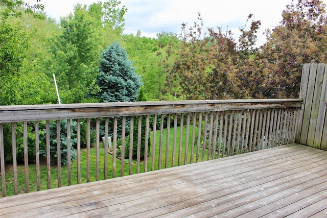 730 Kitterman Cir, Norwalk, IA 50211 - wooden terrace featuring a lawn