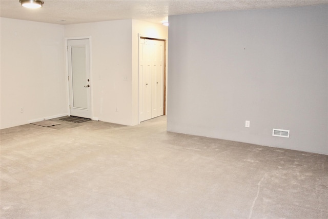 730 Kitterman Cir, Norwalk, IA 50211 - unfurnished room featuring carpet and a textured ceiling