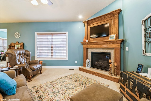 703 NE 46th Ct, Ankeny, IA 50021 - carpeted living room featuring a fireplace and baseboards