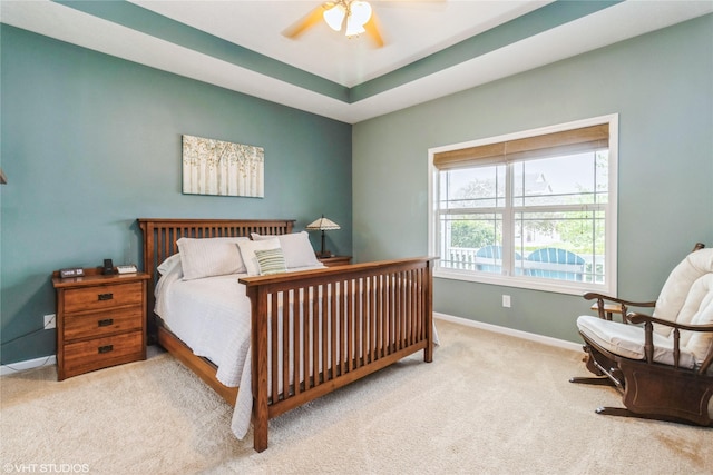 703 NE 46th Ct, Ankeny, IA 50021 - bedroom featuring carpet, baseboards, and ceiling fan