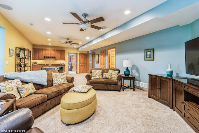 703 NE 46th Ct, Ankeny, IA 50021 - living room featuring light colored carpet, recessed lighting, ceiling fan, and baseboards