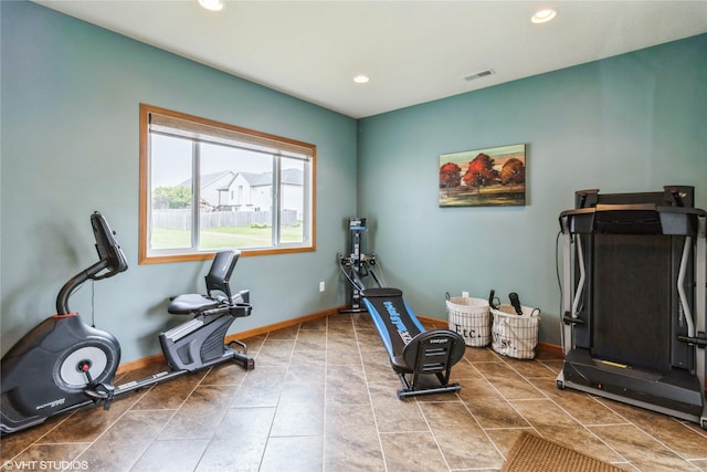 703 NE 46th Ct, Ankeny, IA 50021 - workout area featuring tile patterned flooring, recessed lighting, and baseboards
