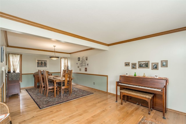 10490 Elmcrest Dr, Clive, IA 50325 - dining space with light wood-type flooring, ornamental molding, and baseboards