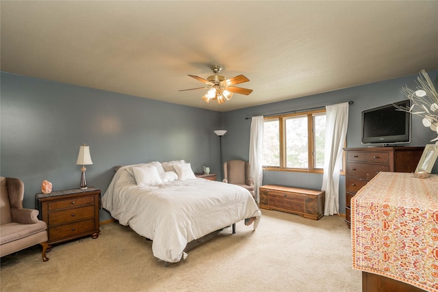 10490 Elmcrest Dr, Clive, IA 50325 - bedroom featuring light colored carpet and a ceiling fan