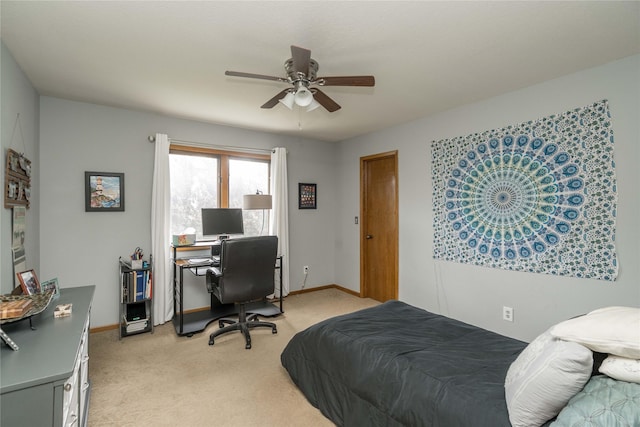 10490 Elmcrest Dr, Clive, IA 50325 - bedroom featuring light carpet, a desk, baseboards, and ceiling fan