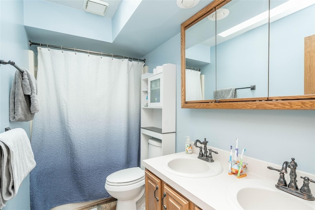 10490 Elmcrest Dr, Clive, IA 50325 - full bath featuring toilet, double vanity, and a shower with curtain
