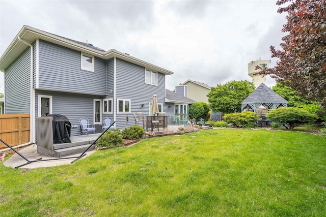 10490 Elmcrest Dr, Clive, IA 50325 - back of house with a gazebo, a patio, and a wooden deck
