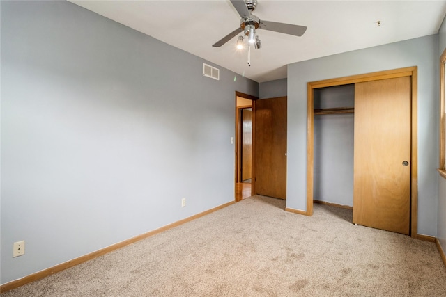 602 SE 7th St, Ankeny, IA 50021 - unfurnished bedroom featuring carpet floors, a closet, and baseboards