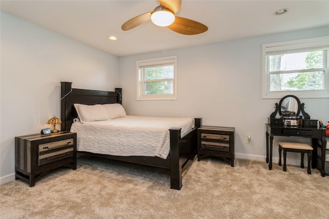 602 SE 7th St, Ankeny, IA 50021 - bedroom with light carpet, baseboards, a ceiling fan, and recessed lighting