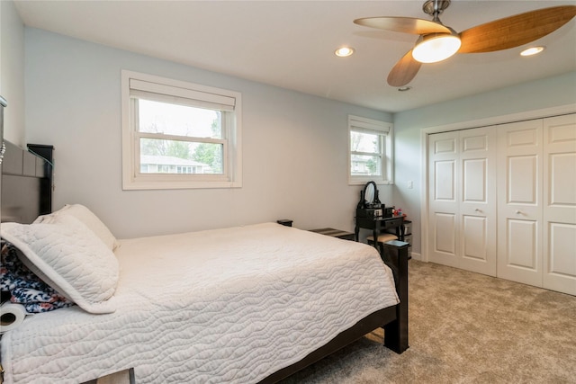 602 SE 7th St, Ankeny, IA 50021 - carpeted bedroom with a closet, recessed lighting, and a ceiling fan