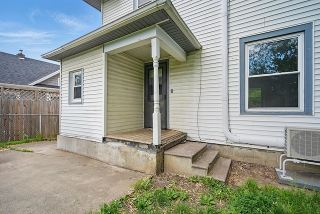 3114 School St, Des Moines, IA 50311 - view of exterior entry with a cooling unit and a patio area