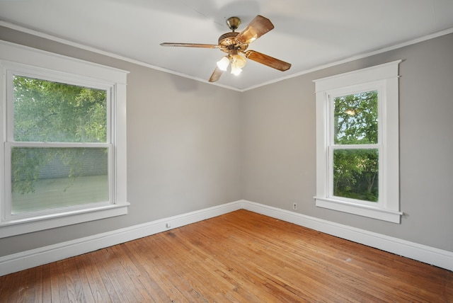 3114 School St, Des Moines, IA 50311 - unfurnished room featuring plenty of natural light, baseboards, ornamental molding, hardwood / wood-style flooring, and ceiling fan