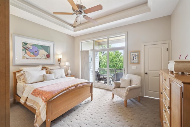 1176 Glen Oaks Dr, West Des Moines, IA 50266 - bedroom with a raised ceiling, access to exterior, a ceiling fan, and ornamental molding