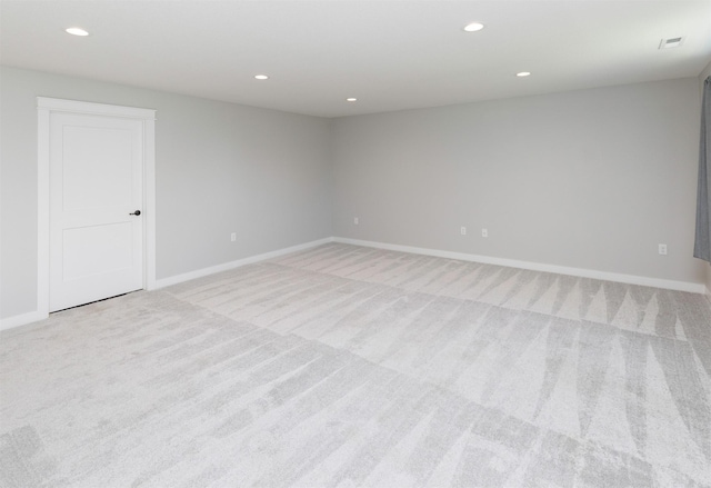 3309 NW Reinhart Dr, Ankeny, IA 50023 - empty room with light carpet, baseboards, and recessed lighting