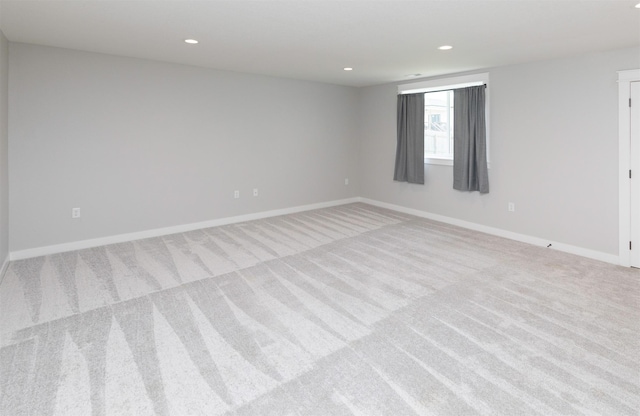 3309 NW Reinhart Dr, Ankeny, IA 50023 - unfurnished room featuring carpet floors, baseboards, and recessed lighting