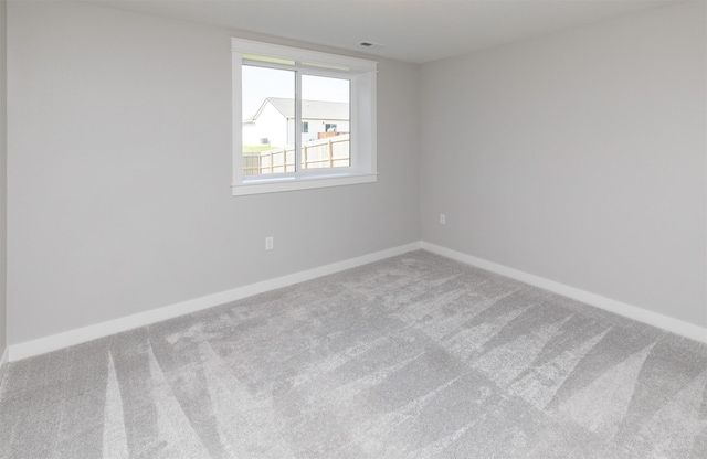 3309 NW Reinhart Dr, Ankeny, IA 50023 - carpeted empty room with baseboards
