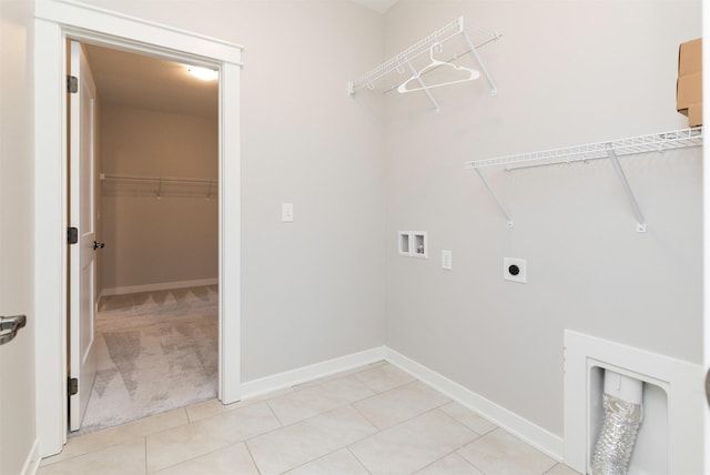 3309 NW Reinhart Dr, Ankeny, IA 50023 - washroom featuring hookup for an electric dryer, washer hookup, baseboards, and light tile patterned floors