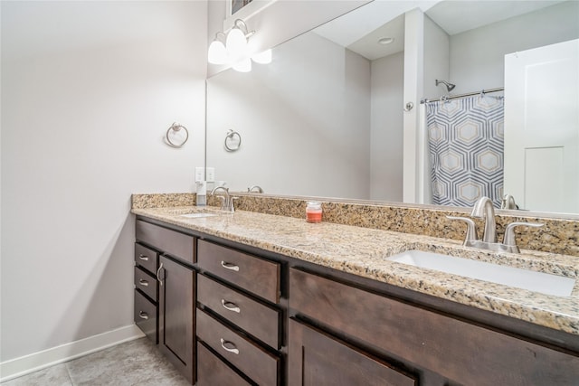 2658 SW 20th Cir, Ankeny, IA 50023 - full bath with double vanity, baseboards, and tile patterned floors