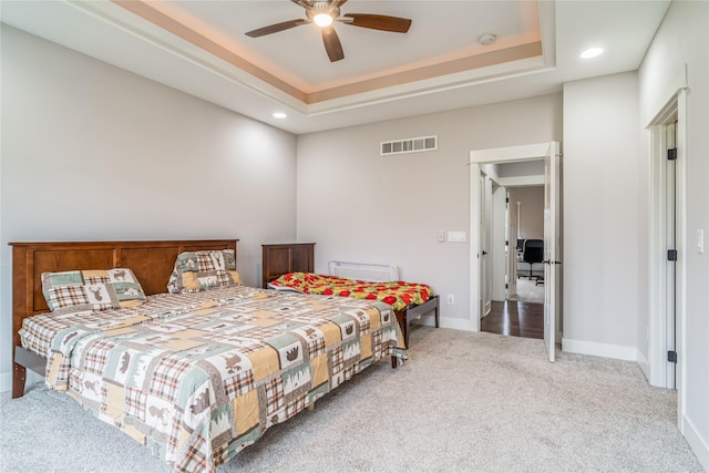 2658 SW 20th Cir, Ankeny, IA 50023 - bedroom featuring carpet, baseboards, recessed lighting, a raised ceiling, and ceiling fan
