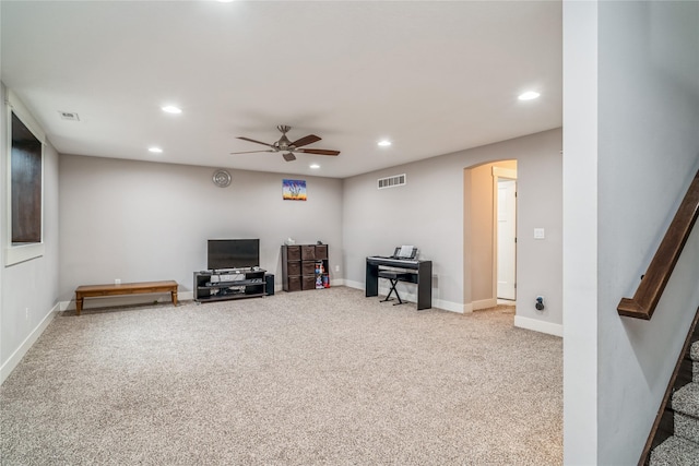 2658 SW 20th Cir, Ankeny, IA 50023 - living room featuring a ceiling fan, recessed lighting, carpet flooring, stairs, and baseboards