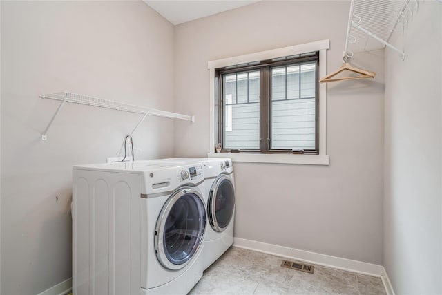 2658 SW 20th Cir, Ankeny, IA 50023 - laundry area with washer and clothes dryer and baseboards