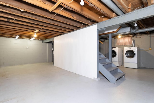 221 W Division St, Colfax, IA 50054 - unfinished basement featuring washing machine and clothes dryer and stairway