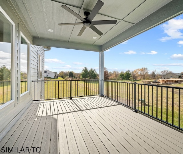 4641 179th St, Urbandale, IA 50323 - wooden deck with ceiling fan and a lawn