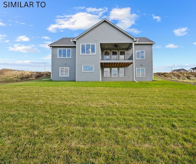 4641 179th St, Urbandale, IA 50323 - back of house with ceiling fan, a balcony, and a yard