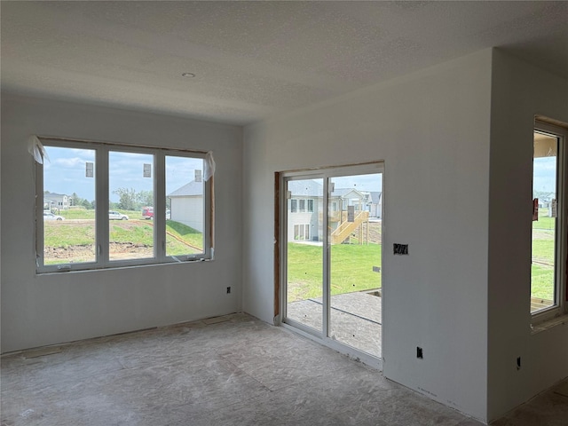 4641 179th St, Urbandale, IA 50323 - spare room with a textured ceiling