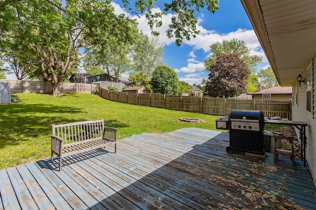 1406 110th Pl, Knoxville, IA 50138 - deck with grilling area and an outdoor fire pit
