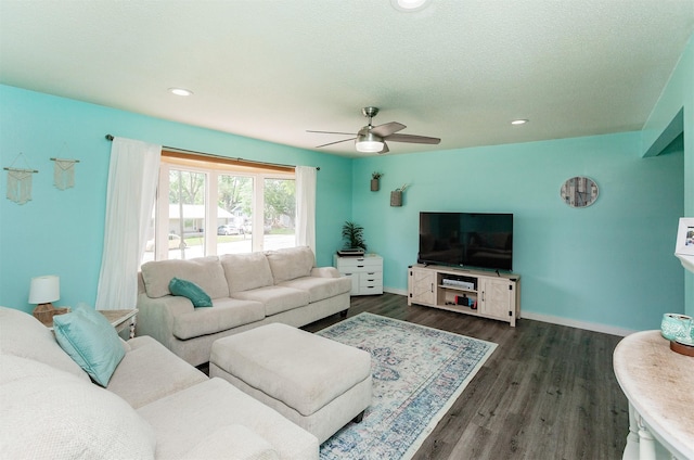 1406 110th Pl, Knoxville, IA 50138 - living area with a ceiling fan, dark wood-type flooring, baseboards, and recessed lighting