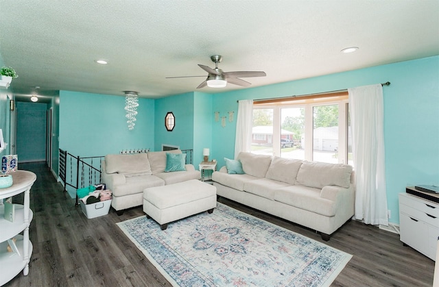 1406 110th Pl, Knoxville, IA 50138 - living area featuring ceiling fan, dark wood-style floors, a textured ceiling, and recessed lighting