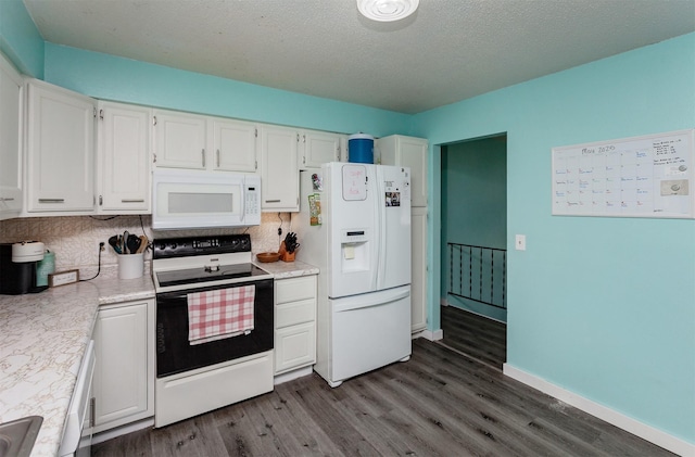 1406 110th Pl, Knoxville, IA 50138 - kitchen featuring white appliances, dark wood finished floors, decorative backsplash, white cabinetry, and a textured ceiling