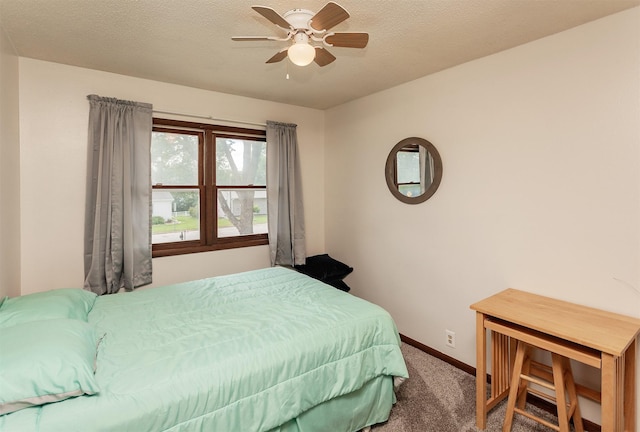1406 110th Pl, Knoxville, IA 50138 - bedroom featuring carpet, baseboards, and a ceiling fan