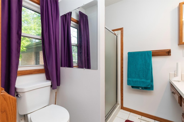 936 15th St, West Des Moines, IA 50265 - full bath featuring toilet, a shower stall, vanity, and tile patterned flooring