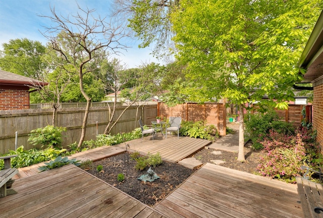 936 15th St, West Des Moines, IA 50265 - wooden deck featuring a fenced backyard
