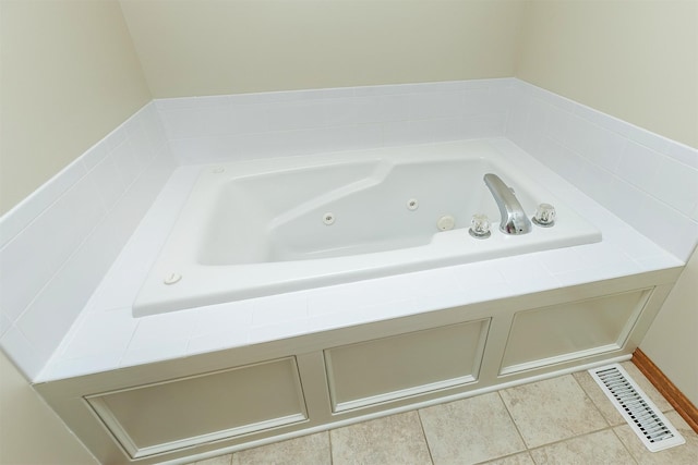 5525 SE 29th Ct, Des Moines, IA 50320 - bathroom with a tub with jets and tile patterned flooring