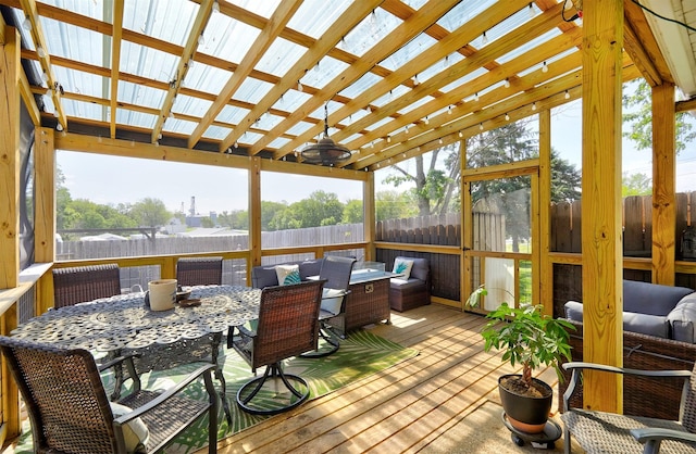 623 W Front St, Stuart, IA 50250 - deck featuring outdoor dining space, a fenced backyard, and outdoor lounge area