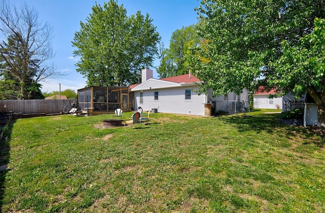 623 W Front St, Stuart, IA 50250 - view of yard with a sunroom